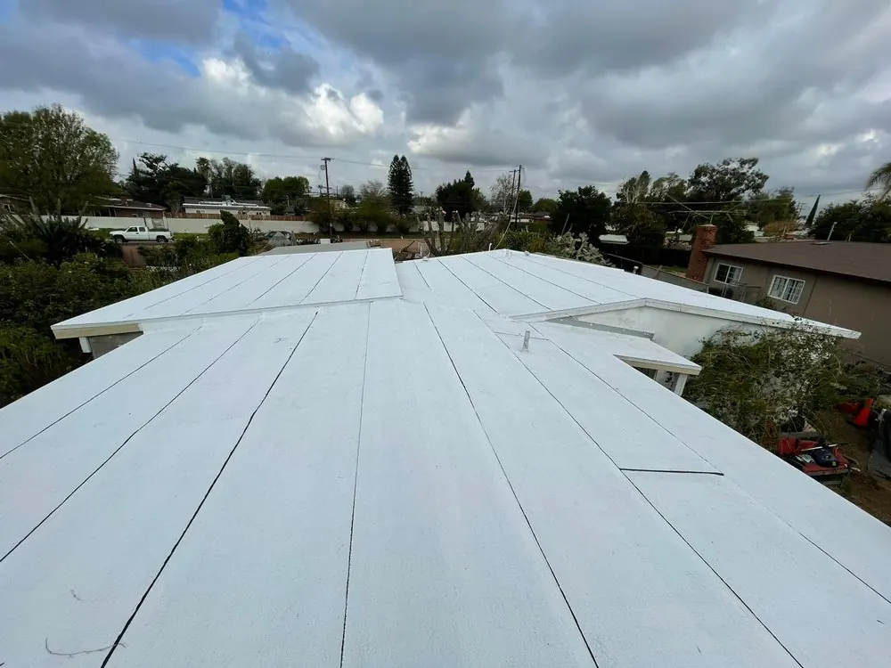 Smart Roofing project - New Flat Roof Installation - White Polyfresko Single-Ply Membrane in Los Angeles