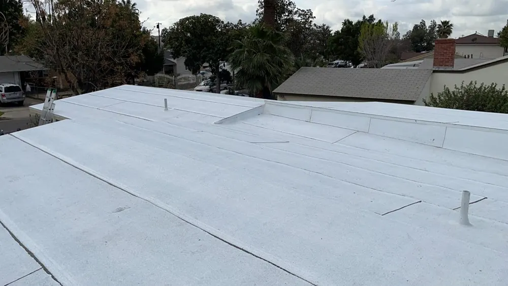 Smart Roofing project - New Flat Roof Installation - White Polyfresko Single-Ply Membrane in Los Angeles